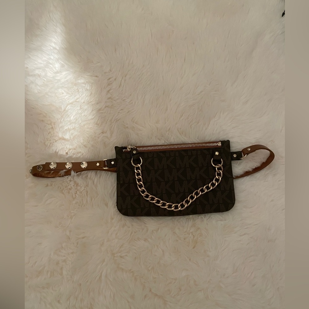 Micheal Kors Fanny pack. Can be used around your waist or across your chest.